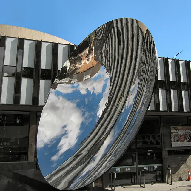 Tilted Sky Mirror Sculpture made of stainless steel