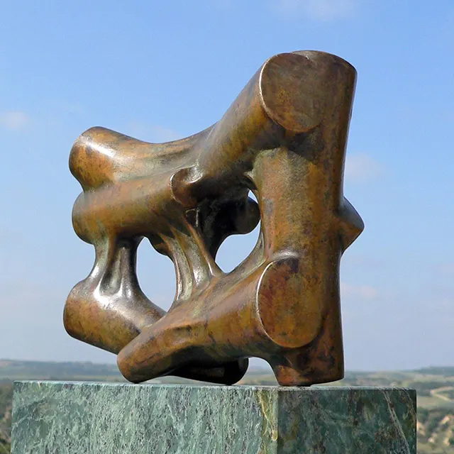 bronze Abstract Shape Sculpture showing interlocking cylindrical forms