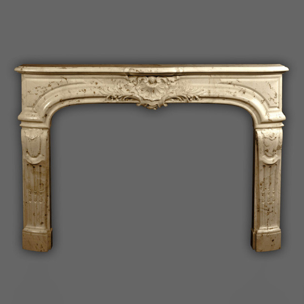cream Marble Mantel for Fireplace with intricate Louis XIV style carvings
