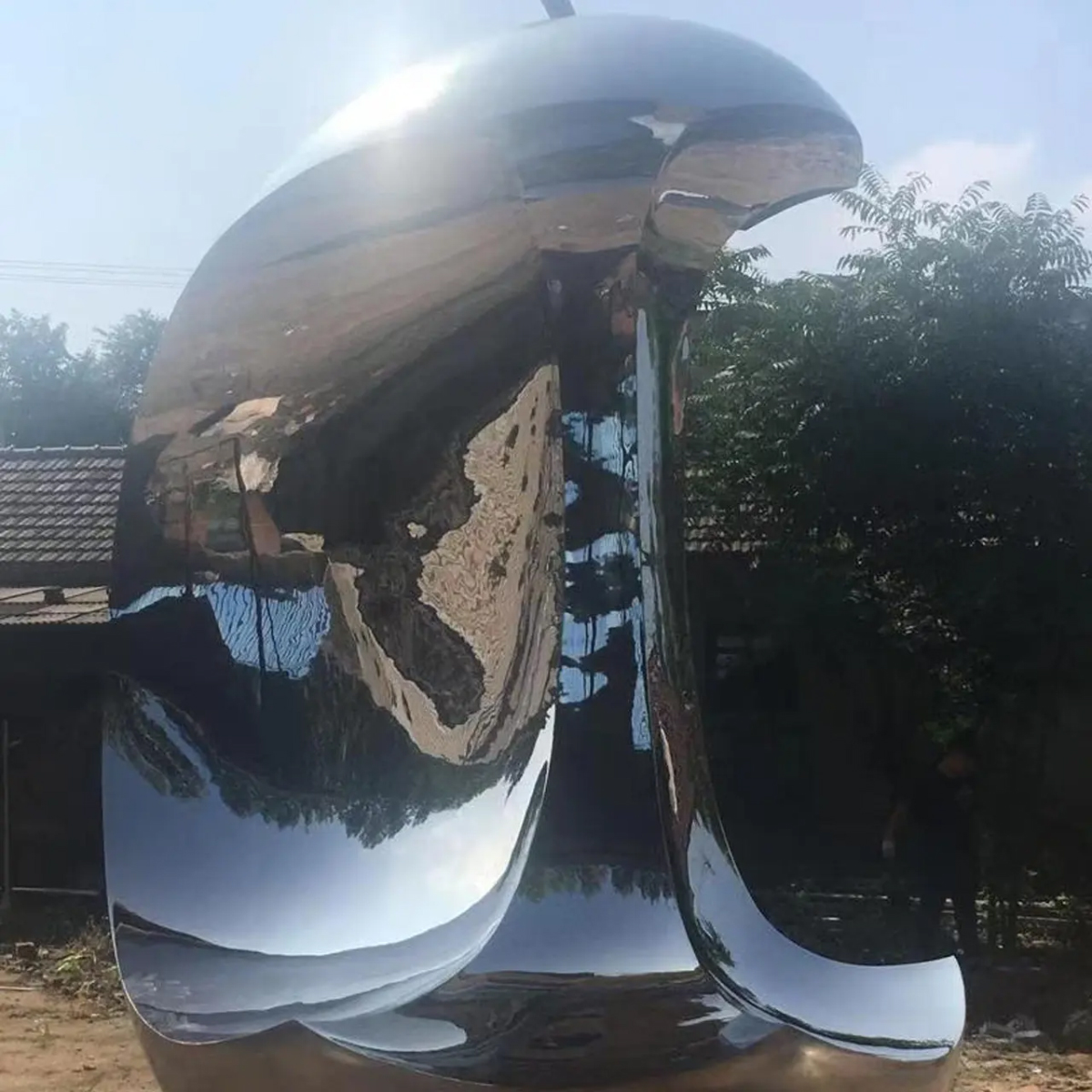 large outdoor stainless steel Apple Core Sculpture