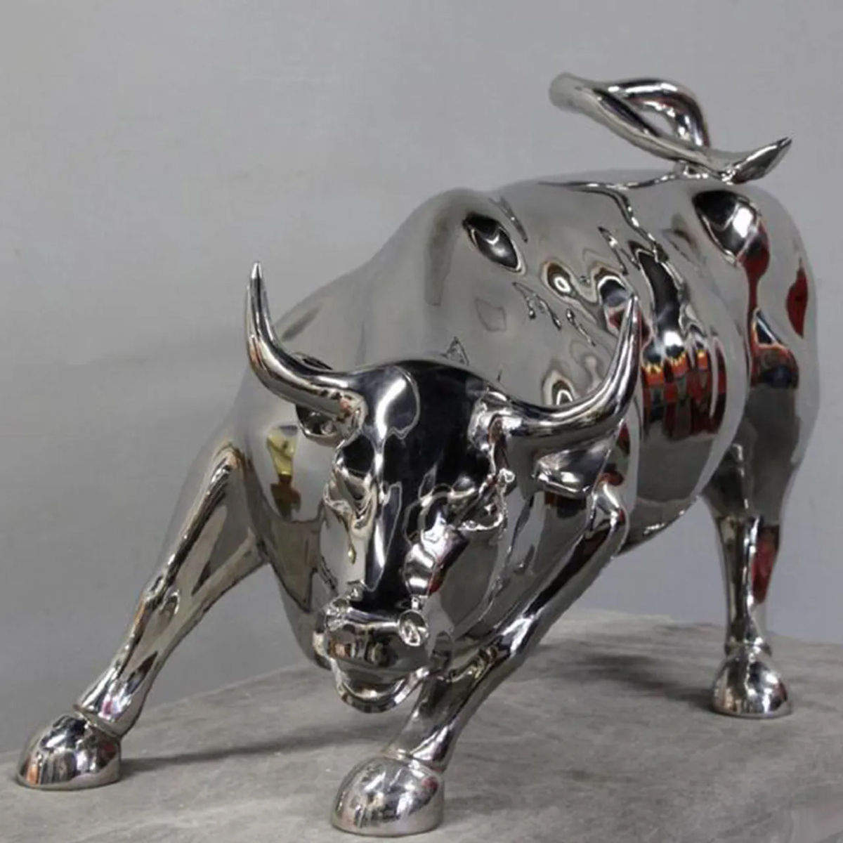 stainless steel bull statue with mirror-polished finish