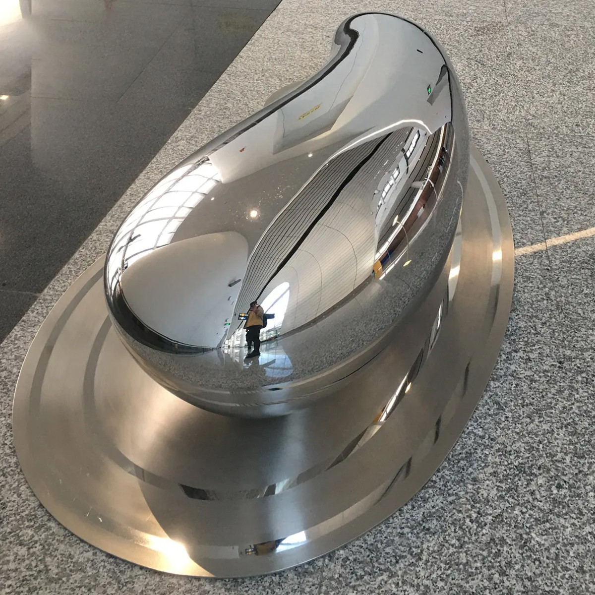 stone-like polished steel sculpture