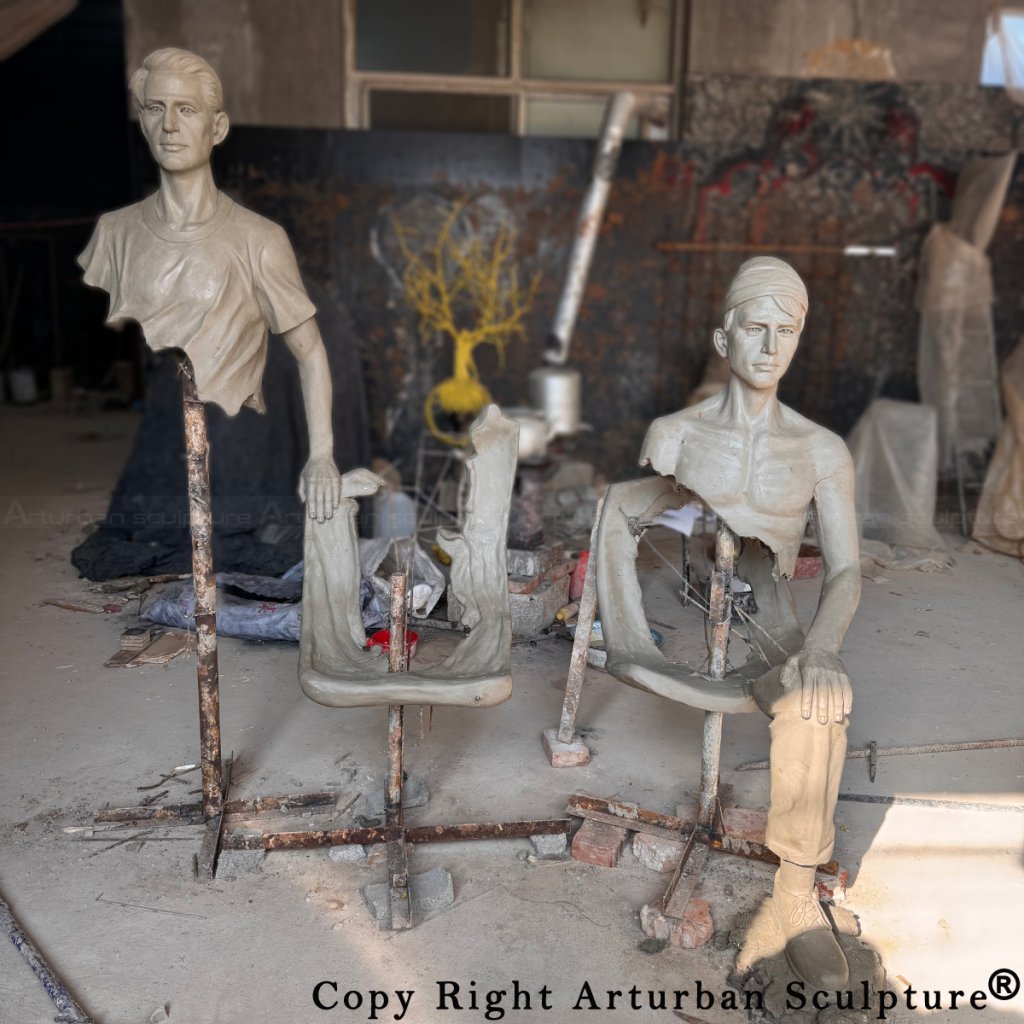 1-Clay modeling stage of Les Voyageurs Sculpture