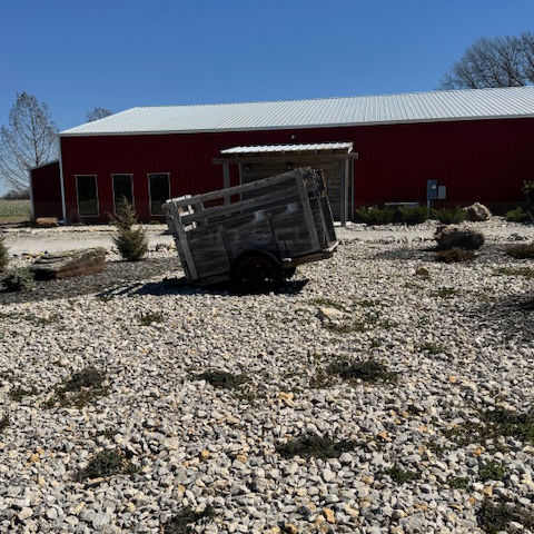 8.1 rocky-yard-in-front-of-a-red-barn
