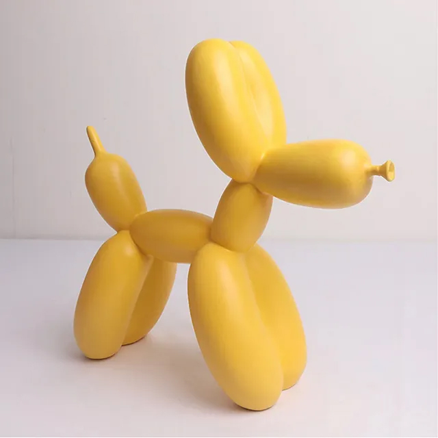 A yellow Balloon Puppy Sculpture made of stainless steel