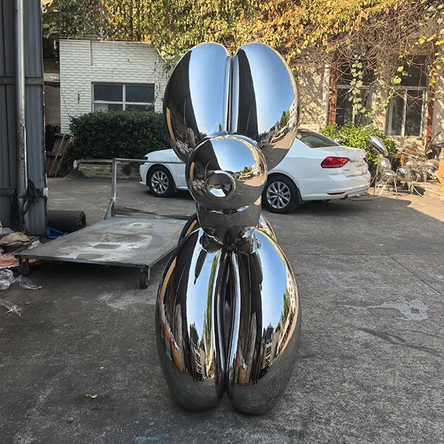Back view of a large Silver Balloon Dog Statue