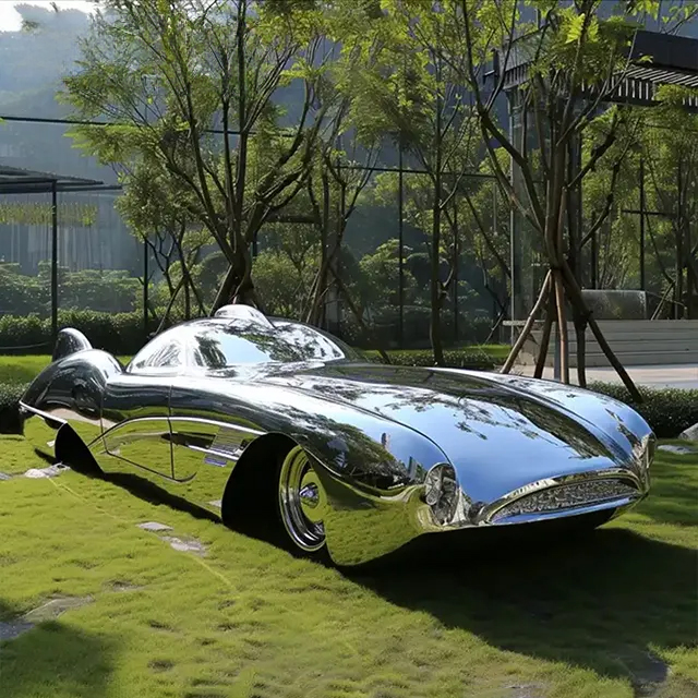 Car Garden Statue in stainless steel with streamlined body and chrome-like reflective surface