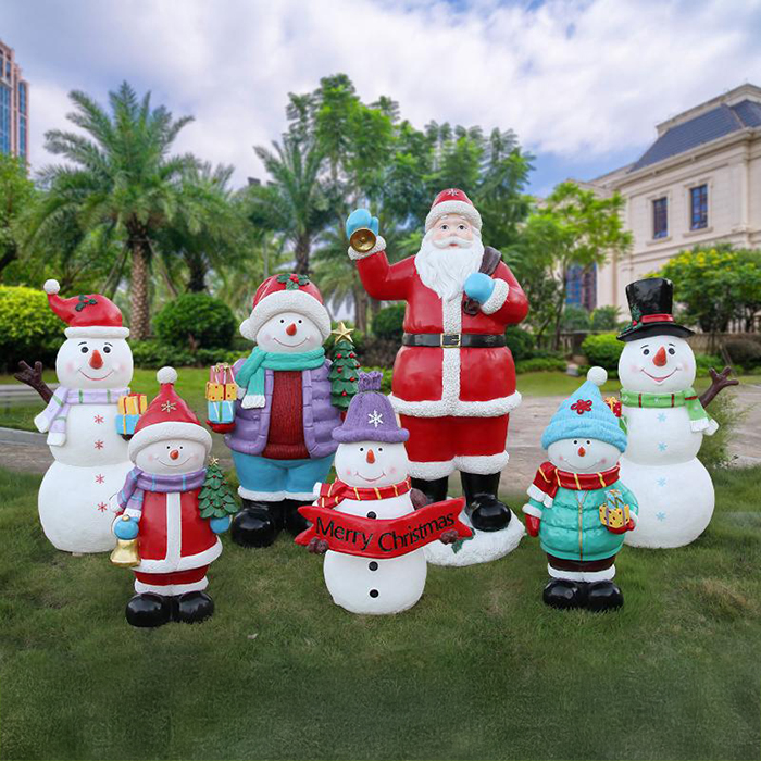 Colorful outdoor Christmas decorations with Santa Claus and snowmen