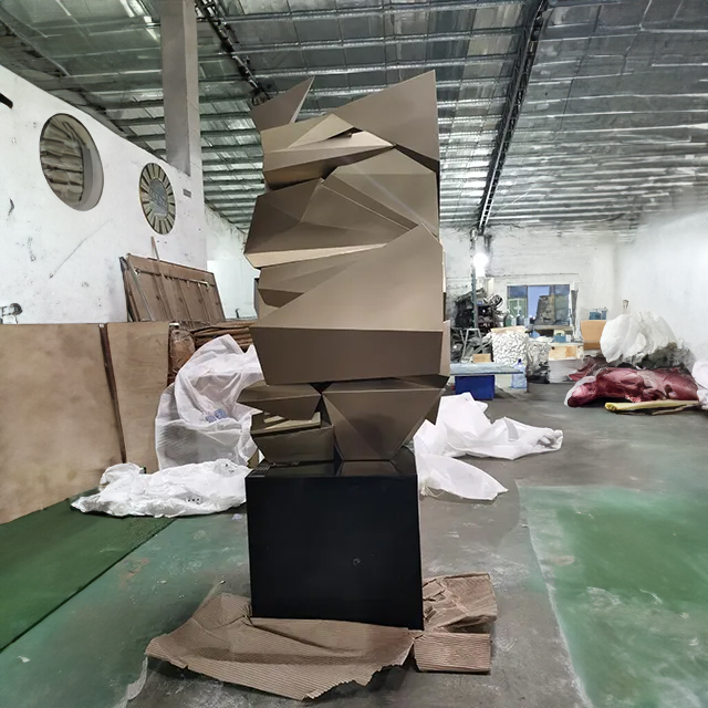 Stainless Steel Wall Sculpture in golden hue