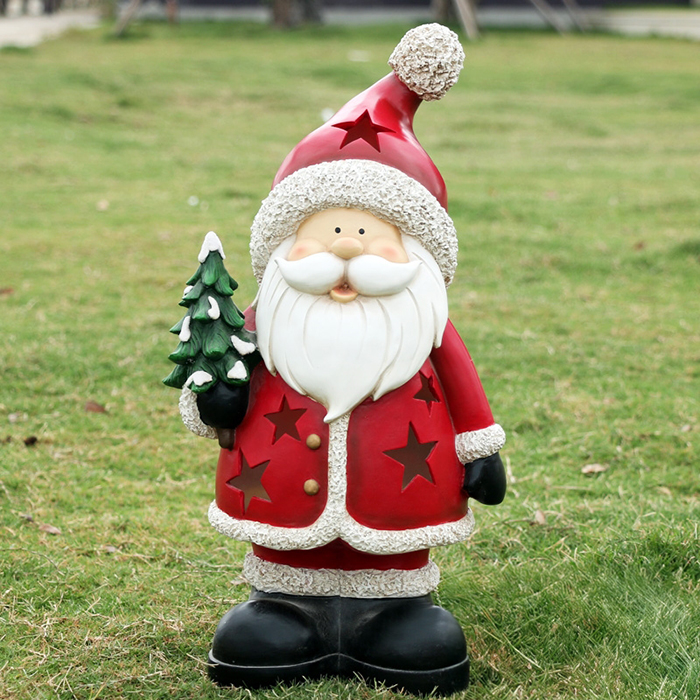 Cute Santa Statue crafted from fiberglass, wearing a red coat with hollow star patterns