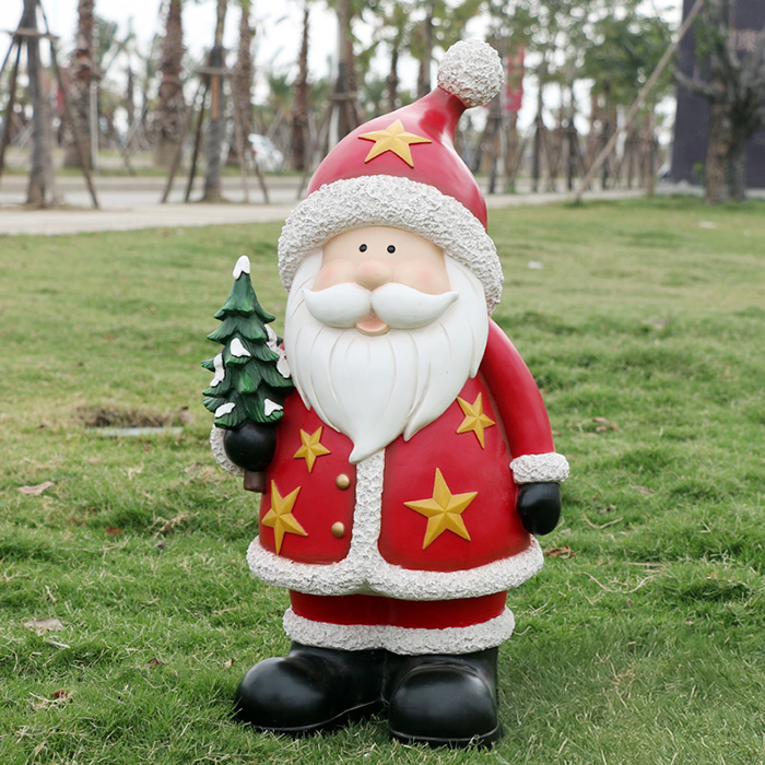 Cute Santa Statue made of fiberglass, dressed in a red coat with golden star