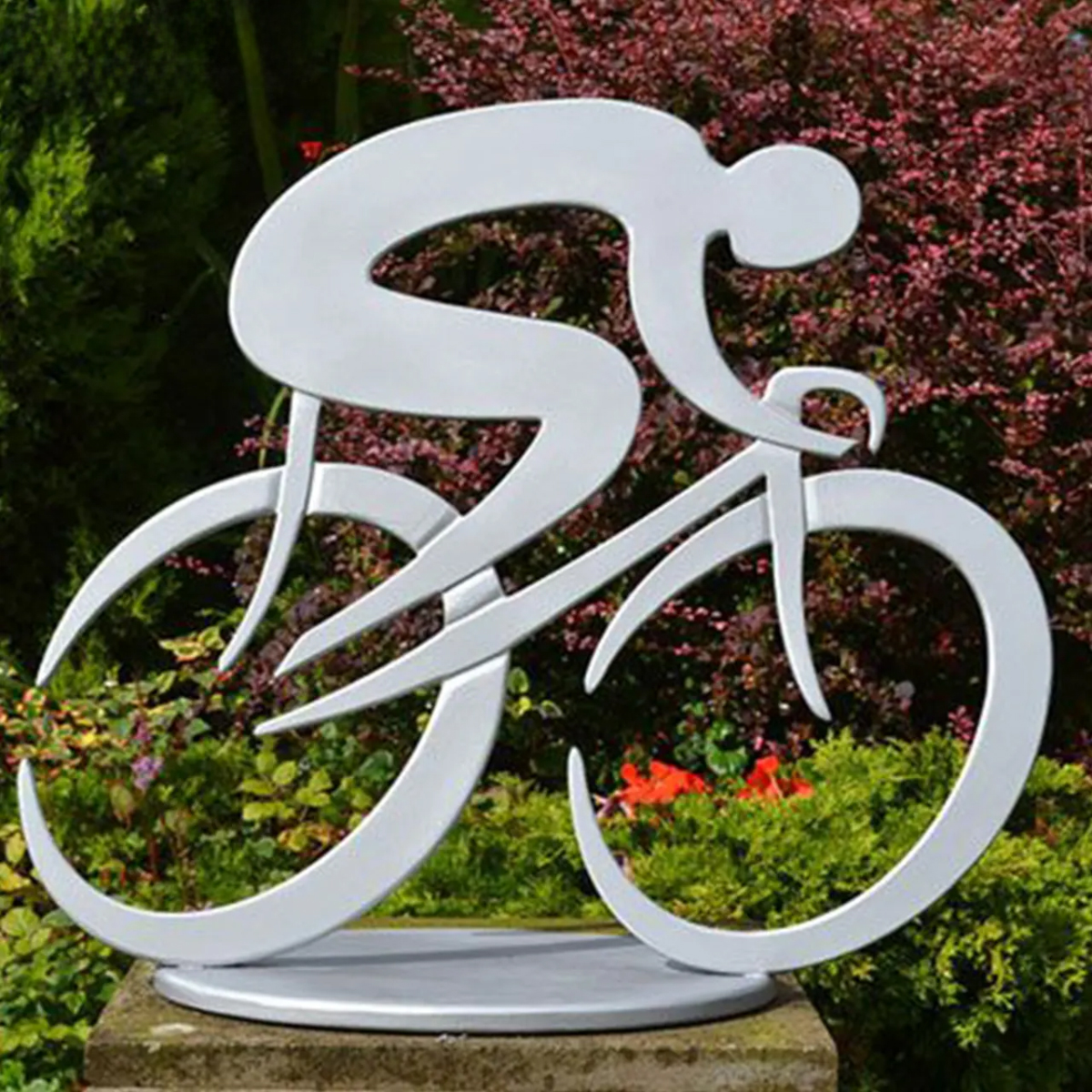 Cycling Art Sculpture made of stainless steel, depicting a streamlined cyclist in a racing position
