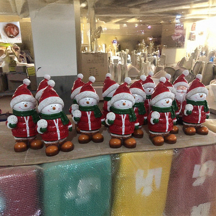 Decorative Snowman Figurine fiberglass with red Santa outfit and green scarf