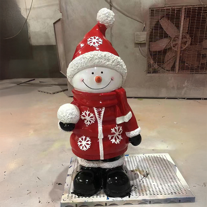 Fiberglass Christmas Snowman Statues featuring a red coat with snowflake patterns
