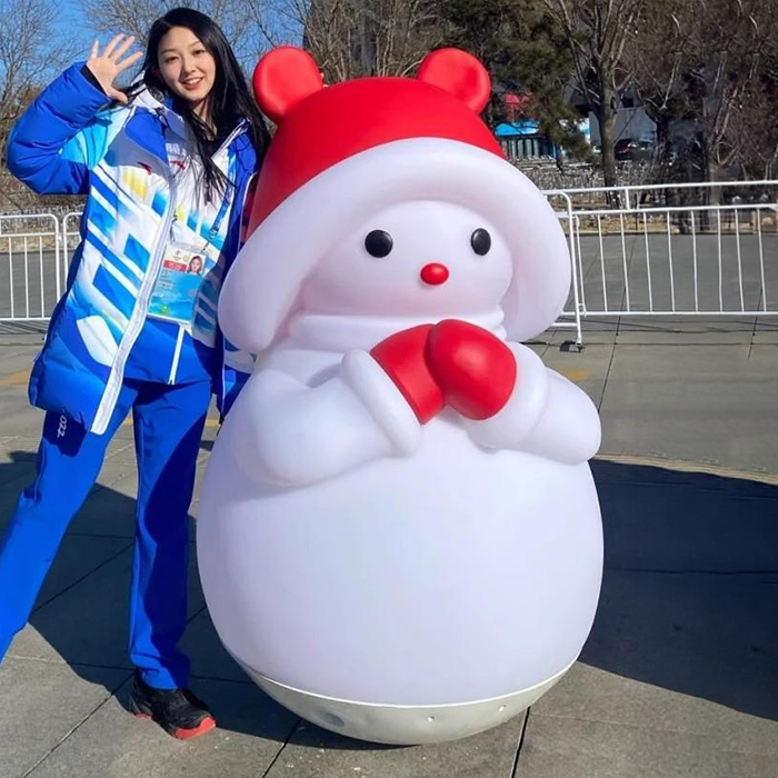 Fiberglass Christmas Snowman Statues in a minimalist design with a red hat and mittens