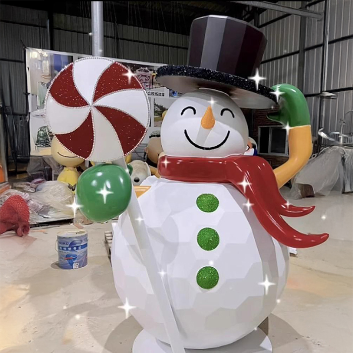 Fiberglass Christmas Snowman Statues with a black top hat, red scarf, and candy cane