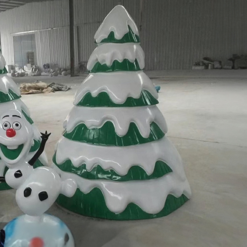 Fiberglass Evergreen Tree Statue with snow-capped green tiers