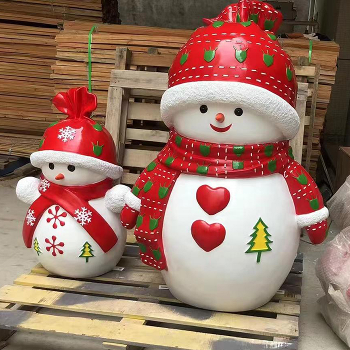Fiberglass Holiday Snowmen Figurines featuring a large snowman paired with a smaller snowman