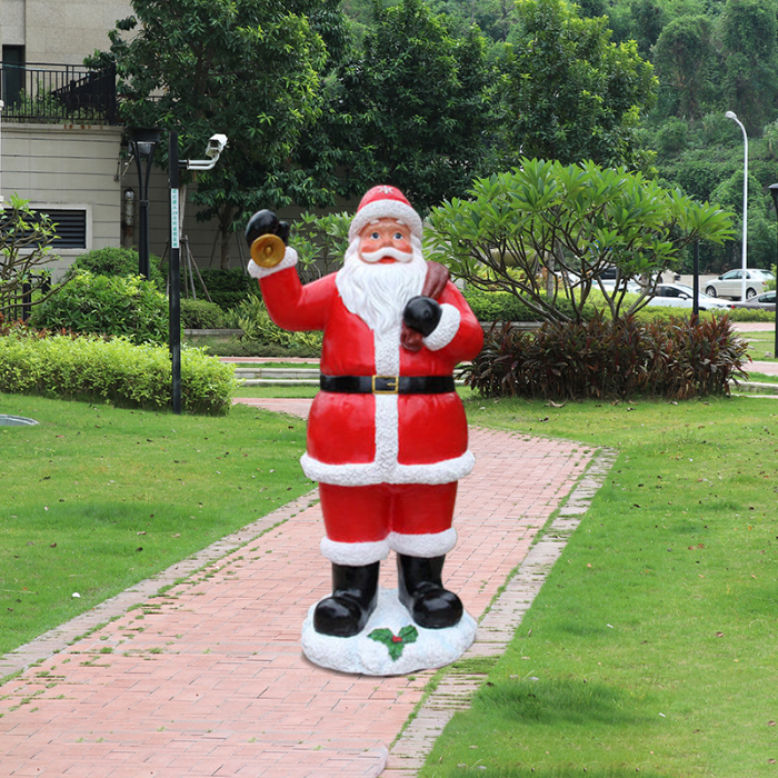 Fiberglass Large Santa Statue for Sale holding a bell and gift bag