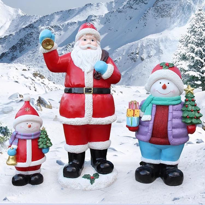 Fiberglass Outdoor Christmas Decorations showing Santa Claus with two snowmen