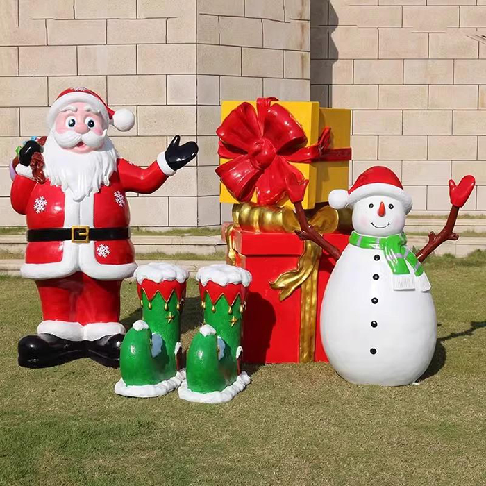 Fiberglass Outdoor Christmas Sculptures featuring Santa Claus, snowman, and large red gift box