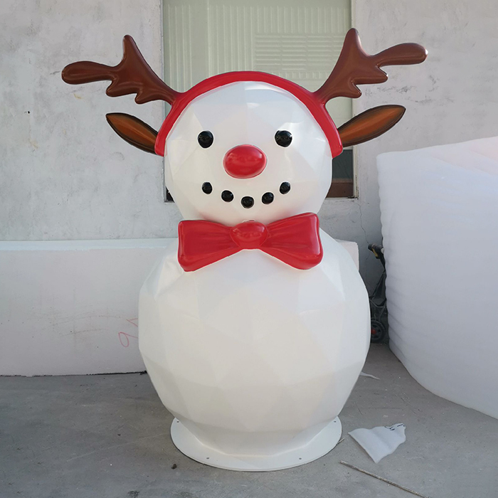 Fiberglass Snowman Christmas Statue with reindeer antlers and red bow tie