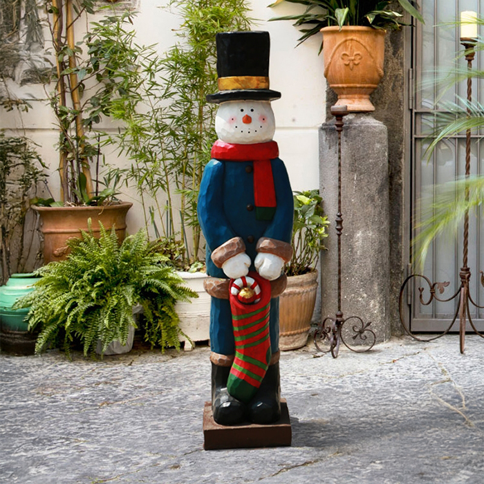 Fiberglass Snowman Figurines on Sale featuring a tall snowman in a blue coat with a red scarf