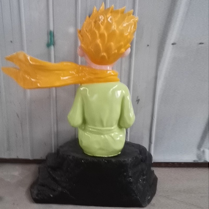 Fiberglass The Little Prince Sculpture back view with green robe and yellow scarf