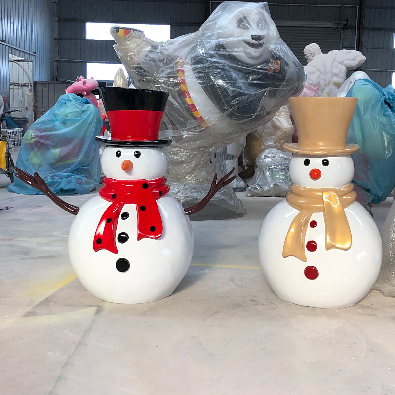 Giant Outdoor Snowman Sculptures, fiberglass material, two snowmen with top hats and scarves