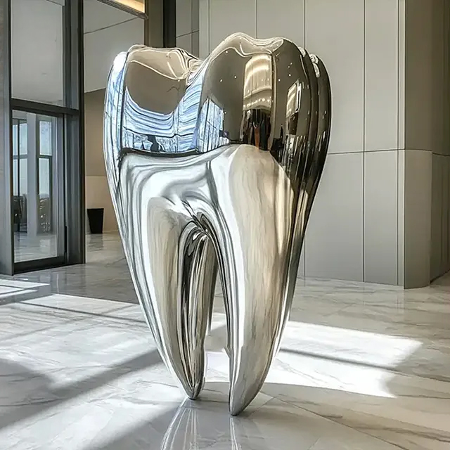 Giant Tooth Sculpture, crafted from stainless steel