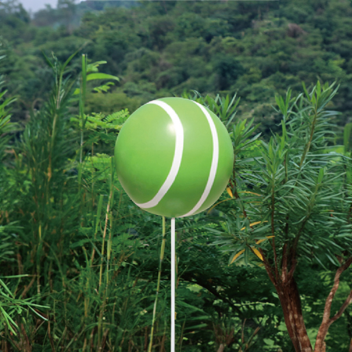 Green fiberglass Giant Lollipop Sculpture with white swirl design