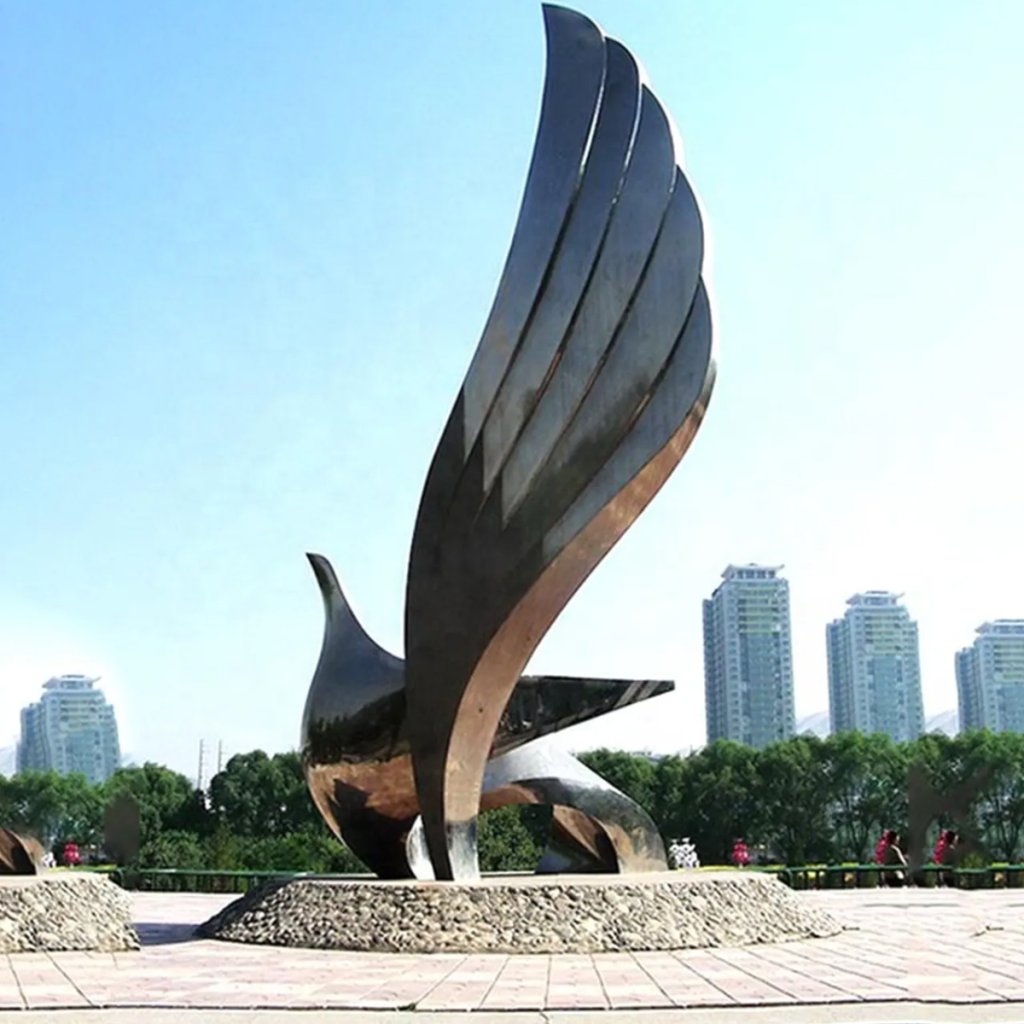 Large Abstract Dove Statue crafted in stainless steel with soaring wings