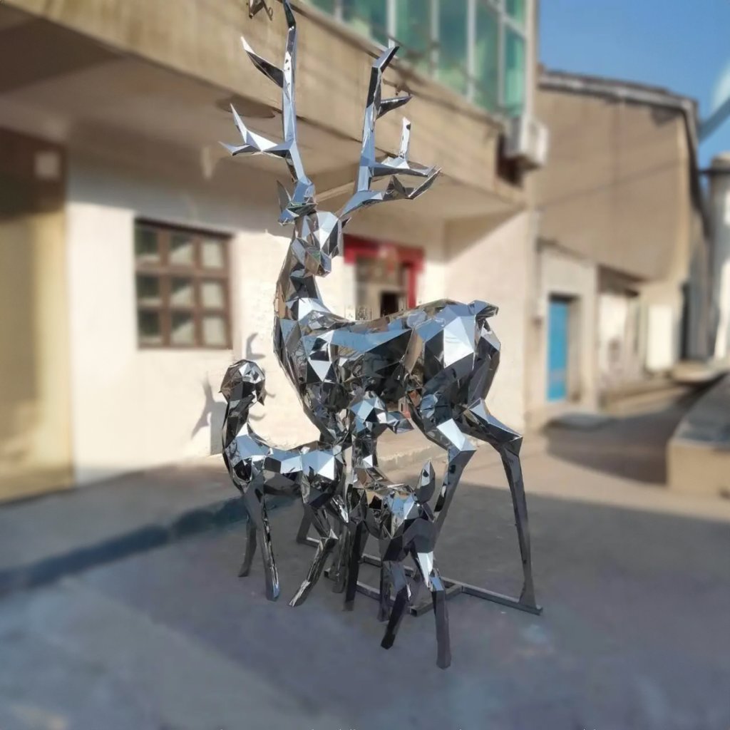 Large Metal Deer Sculpture made of stainless steel, featuring a majestic adult deer and two fawns