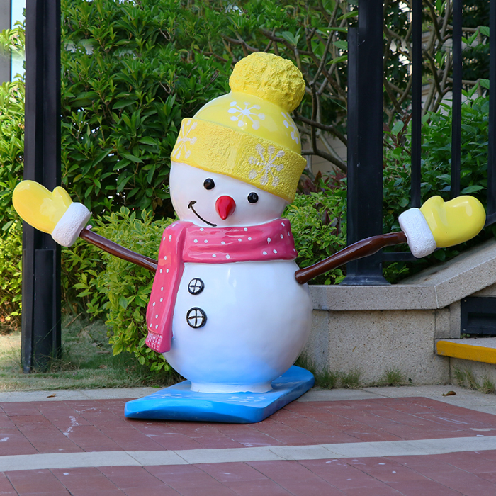 Large Outdoor Resin Snowman wearing yellow hat and red scarf