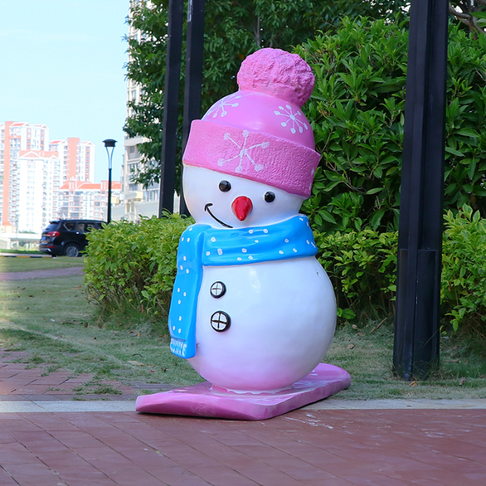 Large Outdoor Resin Snowman with pink hat and blue scarf