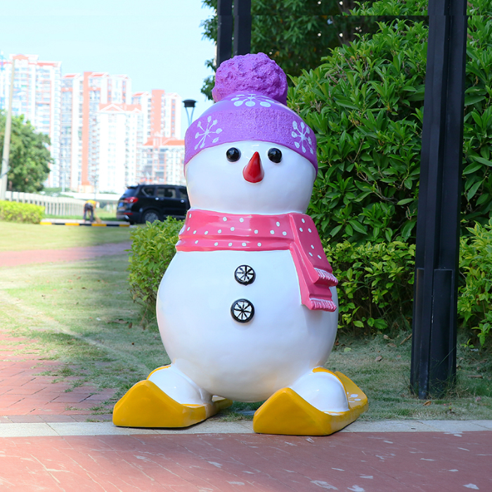 Large Outdoor Resin Snowman with purple hat and pink scarf