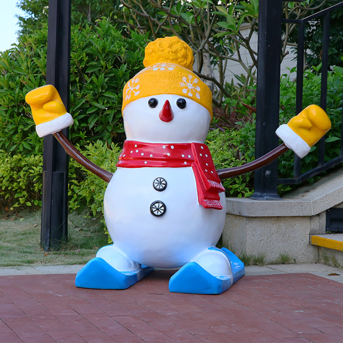 Large Outdoor Resin Snowman with yellow hat and red scarf raising arms