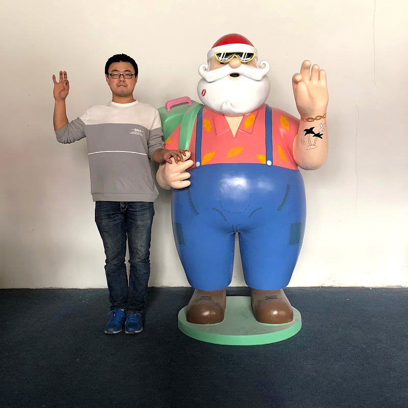 Large Outdoor Santa Statue made of fiberglass, presents a trendy Santa with sunglasses
