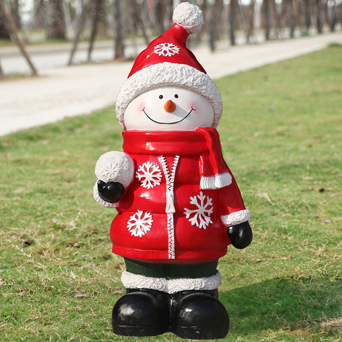 Large Snowman Statue crafted from fiberglass with a playful snowball