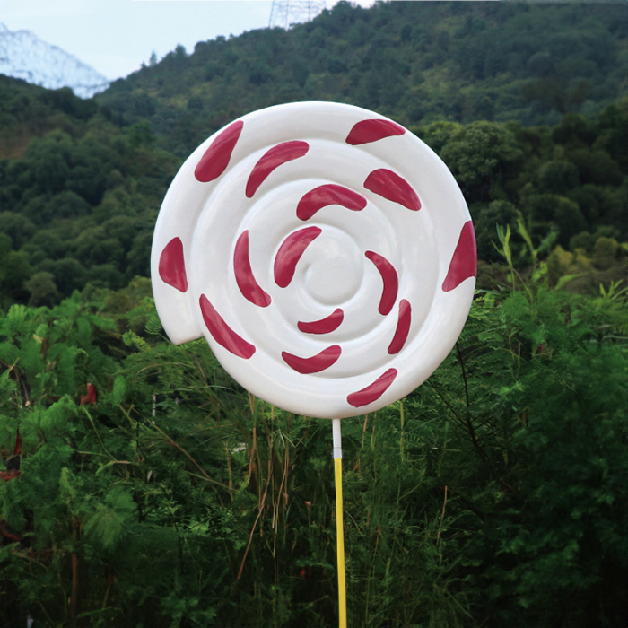 Large Swirl Lollipop Statue fiberglass in bright yellow with white spiral design