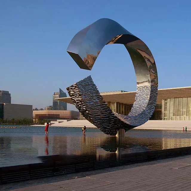 Large abstract circle sculpture made of stainless steel
