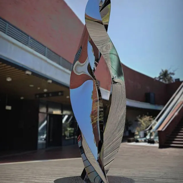 Large polished Metal Loop Sculpture with twisted lines