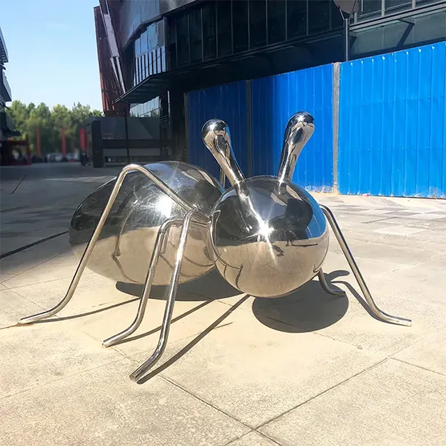 Metal Ant Yard Art stainless steel sculpture with smooth round body and abstract modern design