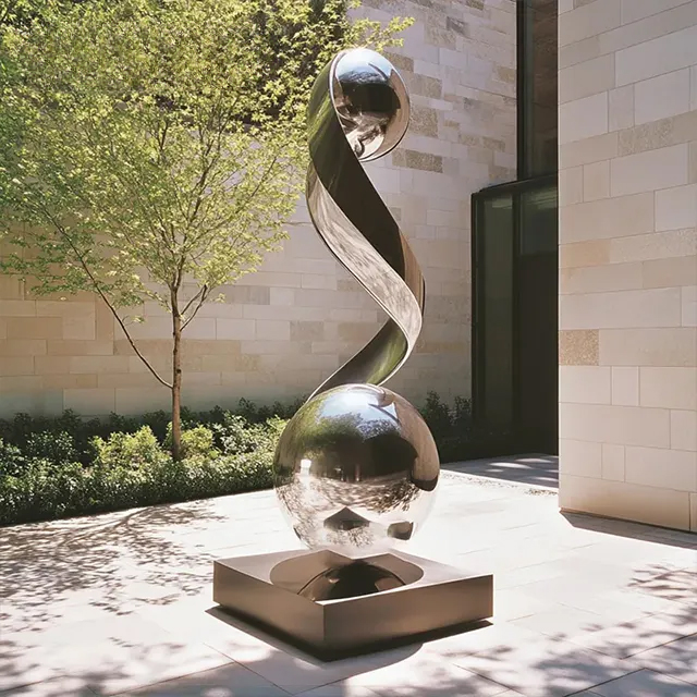 Metal Ball Garden Sculpture in stainless steel with two spheres linked by a twisting spiral band