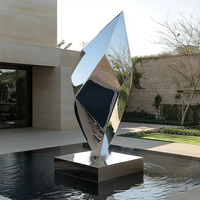Modern Geometric Sculpture in stainless steel with faceted mirror finish