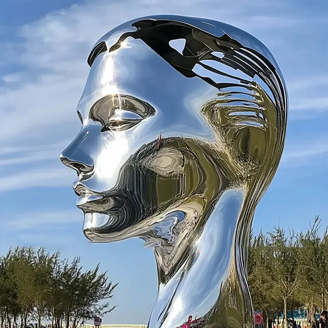 Modern Large Face statue in stainless steel