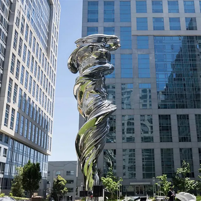Modern Venus Statue made of stainless steel, standing tall among skyscrapers
