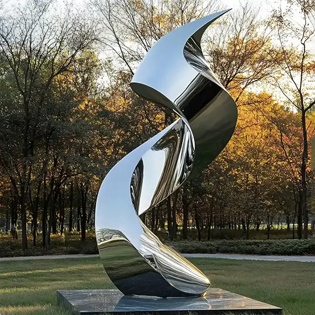 Modern stainless steel spiral statue with twisted ribbon-like design