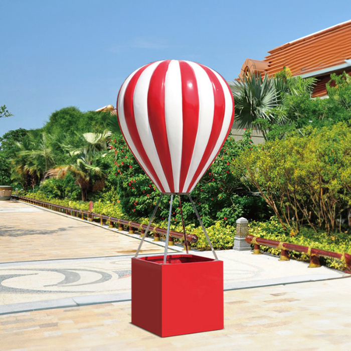Red and white striped fiberglass Christmas Balloon Sculpture