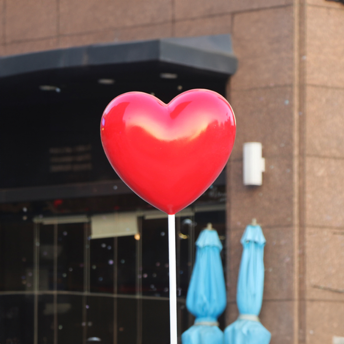 Red heart-shaped fiberglass Christmas Balloon Sculpture